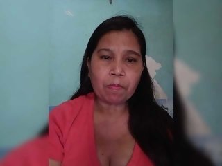 Sex cam sexypajie online! She is 55 years old 
redhead with huge boobs and speaks english, 